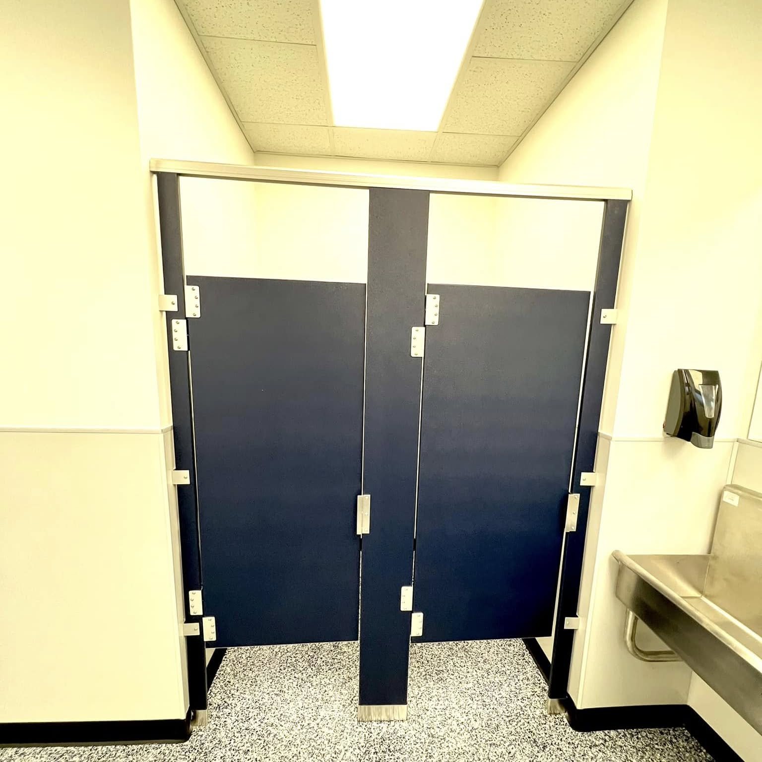 Commercial restroom stalls after renovation