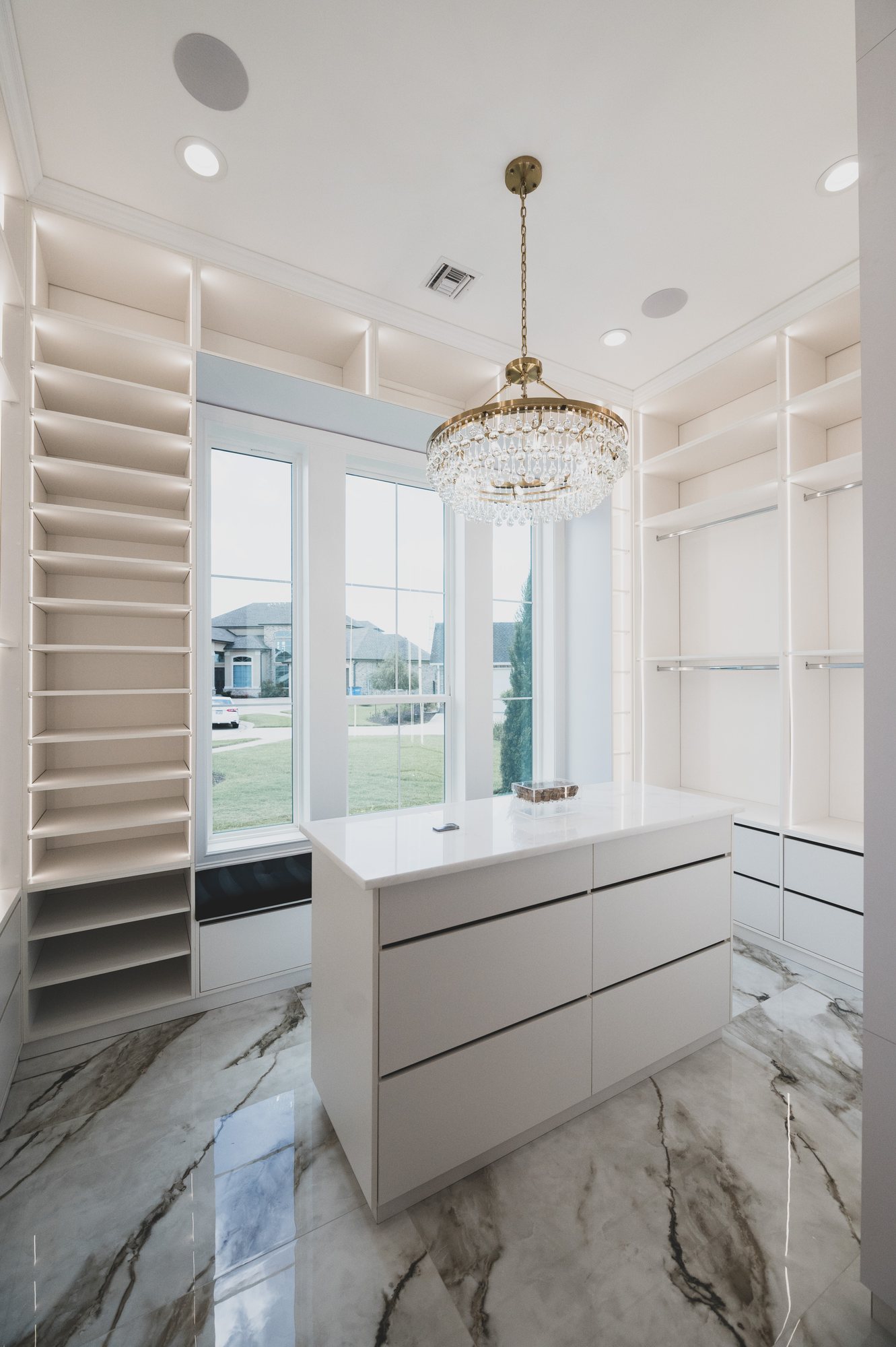 Primary closet at 105 Lac Lafreniere Court