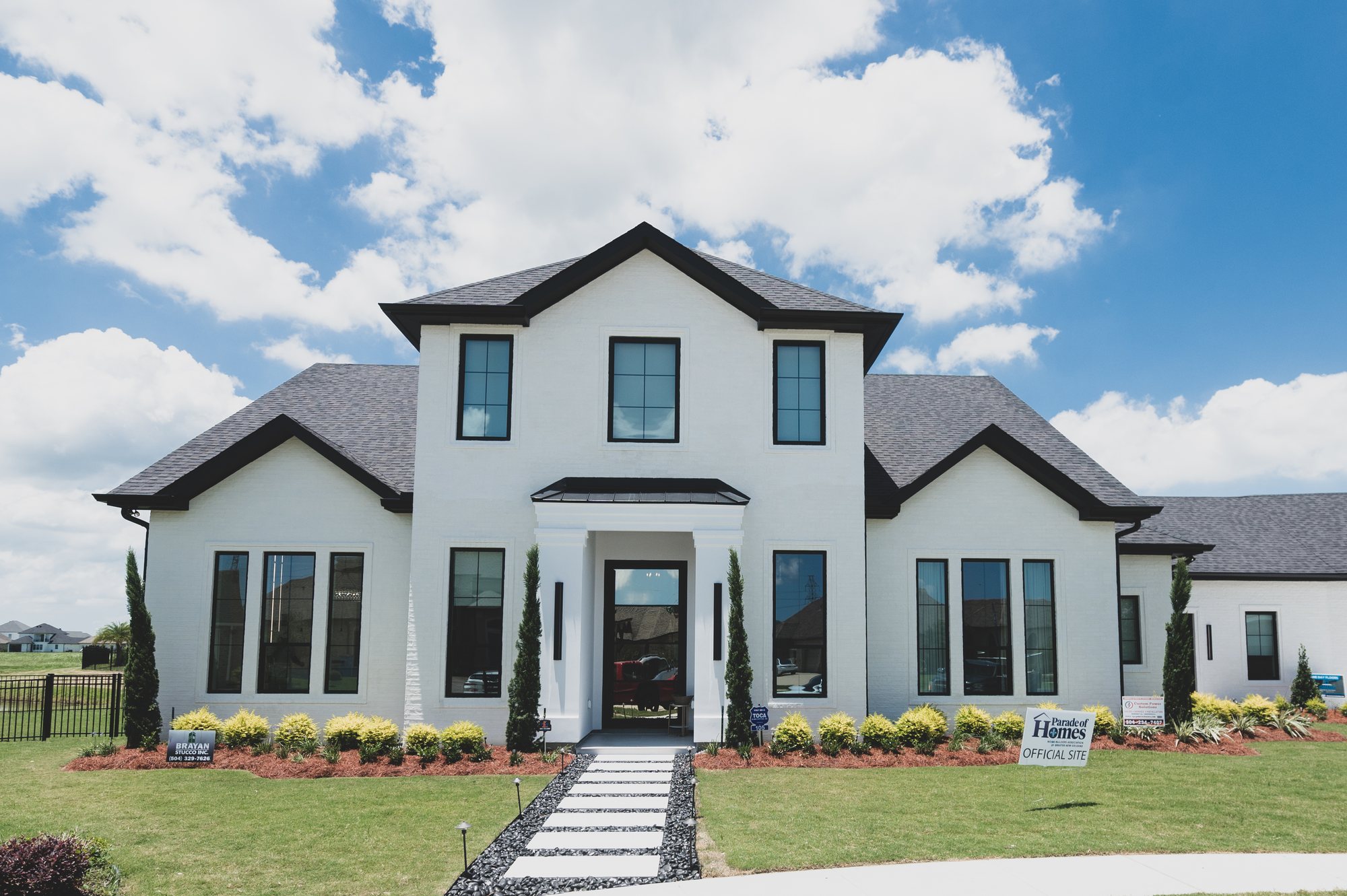 2024 Parade of Homes People’s Choice winning house at 105 Lac Lafreniere Court in Luling, with the official Parade of Homes site sign