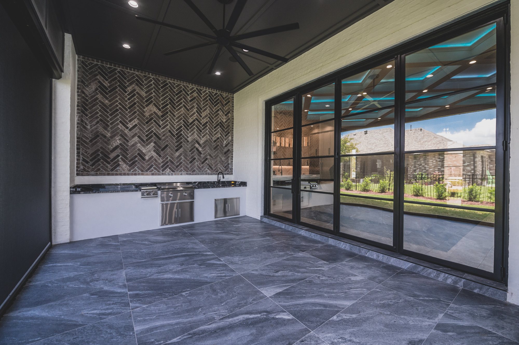 Outdoor kitchen and patio at 105 Lac Lafreniere Court
